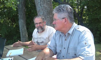 Jack Knight (left) and Ric Zarwell, leaders of the Allamakee County Protectors, talk about their efforts to restrict frac sand mining in their county.