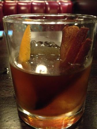 Tipsy Pig cocktail featuring bacon bourbon, on Dec. 13, 2015 at Pullman Bar & Diner in Iowa City .